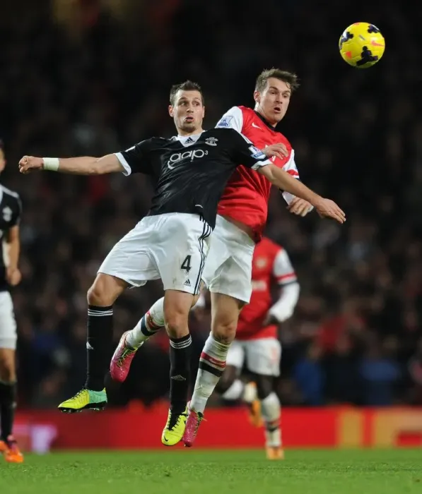 Framed Print : Clash of Midfield Titans: Gibbs vs Schneiderlin - Arsenal vs Southampton, Premier League 2013-14 Framed Print : Clash of Midfield Titans: Gibbs vs Schneiderlin - Arsenal vs Southampton, Premier League 2013-14
