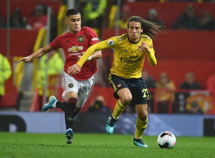 Framed Print : Clash of the Midfield Titans: Guendouzi vs. Pereira - Battle at Old Trafford (Premier League 2019-20) Framed Print : Clash of the Midfield Titans: Guendouzi vs. Pereira - Battle at Old Trafford (Premier League 2019-20)