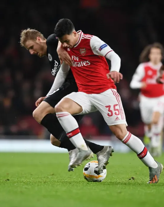 Framed Print : Clash of the Midfield Titans: Guendouzi vs. Hinteregger in Arsenal vs. Eintracht Frankfurt Europa League Battle