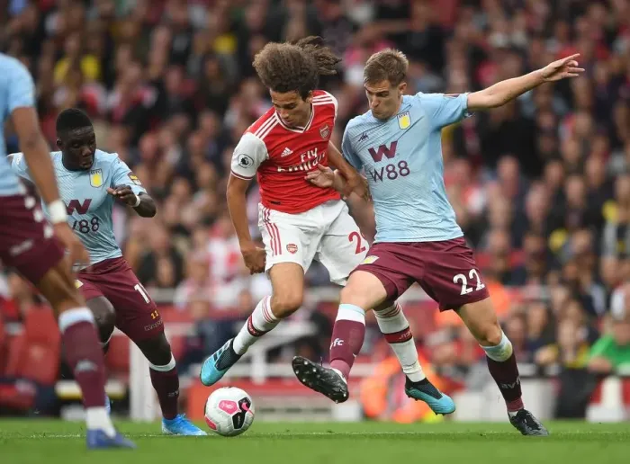 Framed Print : Clash of the Midfield Titans: Guendouzi vs Engels in Arsenal vs Aston Villa Premier League Showdown Framed Print : Clash of the Midfield Titans: Guendouzi vs Engels in Arsenal vs Aston Villa Premier League Showdown