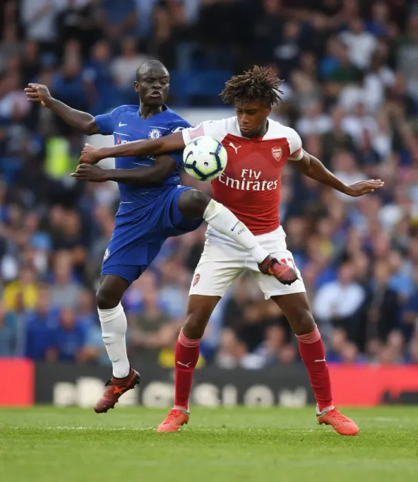 Framed Print : Clash of Midfield Titans: Iwobi vs. Kante - A Premier League Showdown