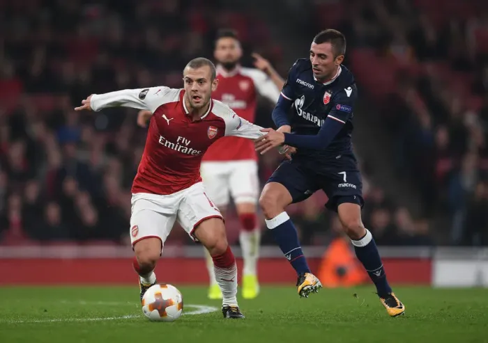 Framed Print : Clash of Midfield Titans: Jack Wilshere vs. Nenad Krsticic in Arsenal's Europa League Battle Framed Print : Clash of Midfield Titans: Jack Wilshere vs. Nenad Krsticic in Arsenal's Europa League Battle