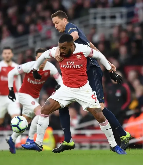 Framed Print : Clash of the Midfield Titans: Lacazette vs Matic - Arsenal vs Manchester United Framed Print : Clash of the Midfield Titans: Lacazette vs Matic - Arsenal vs Manchester United