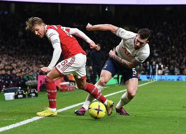 Clash of the Midfield Titans: Odegaard vs. Hojbjerg - A Premier League Showdown between Arsenal and Tottenham, 2022-23