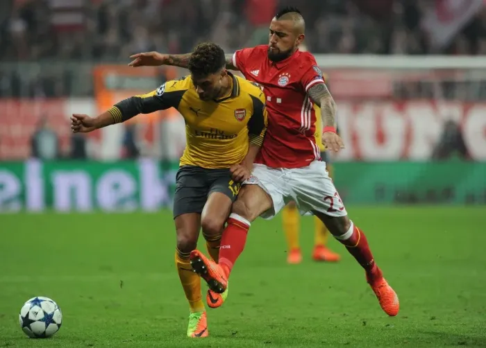 Framed Print : Clash of the Midfield Titans: Oxlade-Chamberlain vs. Vidal - Arsenal vs. Bayern Munich UCL Showdown Framed Print : Clash of the Midfield Titans: Oxlade-Chamberlain vs. Vidal - Arsenal vs. Bayern Munich UCL Showdown