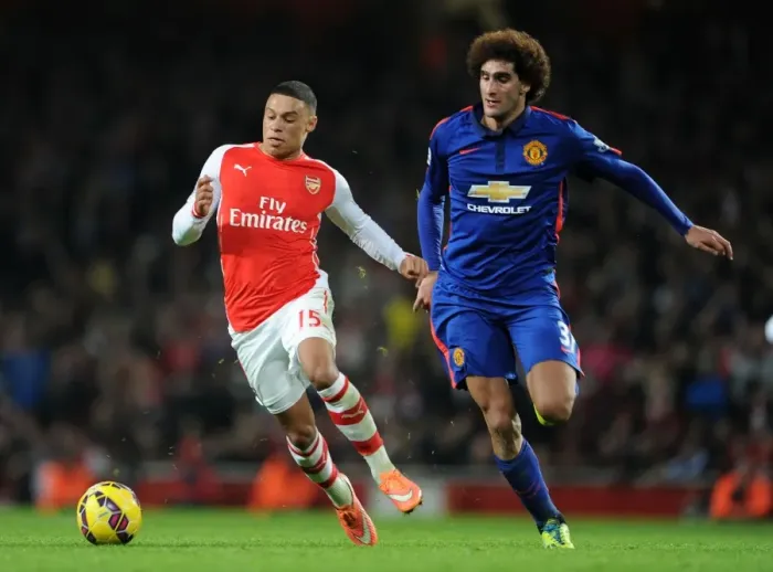 Framed Print : Clash of Midfield Titans: Oxlade-Chamberlain vs Fellaini (Arsenal vs Manchester United, 2014-15) Framed Print : Clash of Midfield Titans: Oxlade-Chamberlain vs Fellaini (Arsenal vs Manchester United, 2014-15)