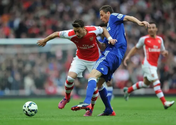 Framed Print : Clash of Midfield Titans: Ozil vs. Matic - Arsenal vs. Chelsea Showdown Framed Print : Clash of Midfield Titans: Ozil vs. Matic - Arsenal vs. Chelsea Showdown
