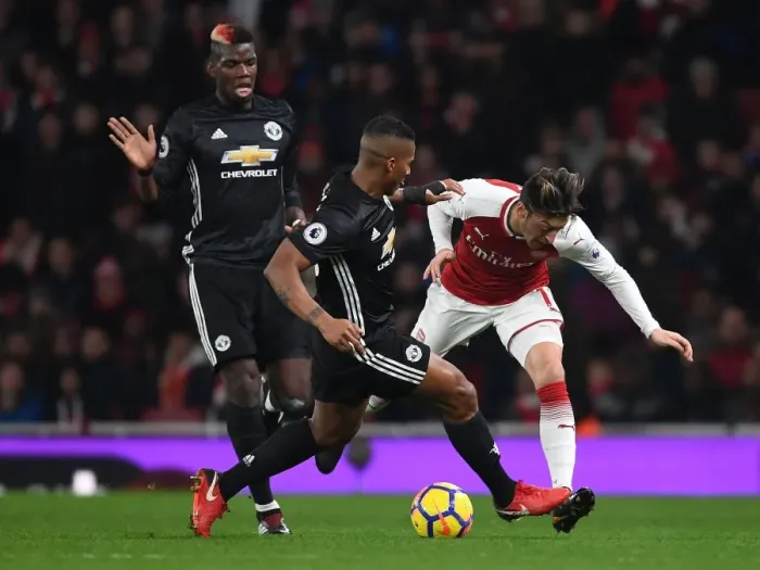 Framed Print : Clash of the Midfield Titans: Ozil vs. Pogba & Valencia (Arsenal vs. Manchester United, 2017-18)