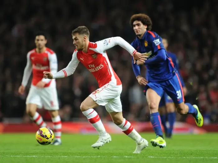 Framed Print : Clash of Midfield Titans: Ramsey vs. Fellaini - Arsenal vs. Manchester United, Premier League 2014-15 Framed Print : Clash of Midfield Titans: Ramsey vs. Fellaini - Arsenal vs. Manchester United, Premier League 2014-15