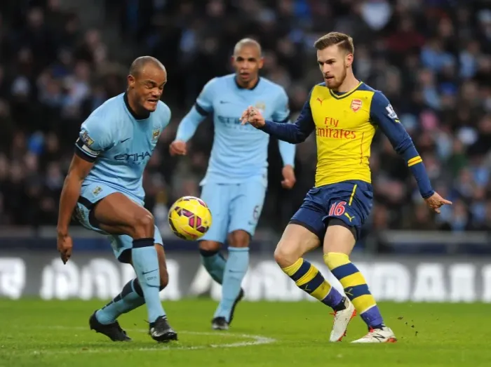 Framed Print : Clash of Midfield Titans: Ramsey vs. Kompany - Manchester City vs. Arsenal, Premier League Framed Print : Clash of Midfield Titans: Ramsey vs. Kompany - Manchester City vs. Arsenal, Premier League