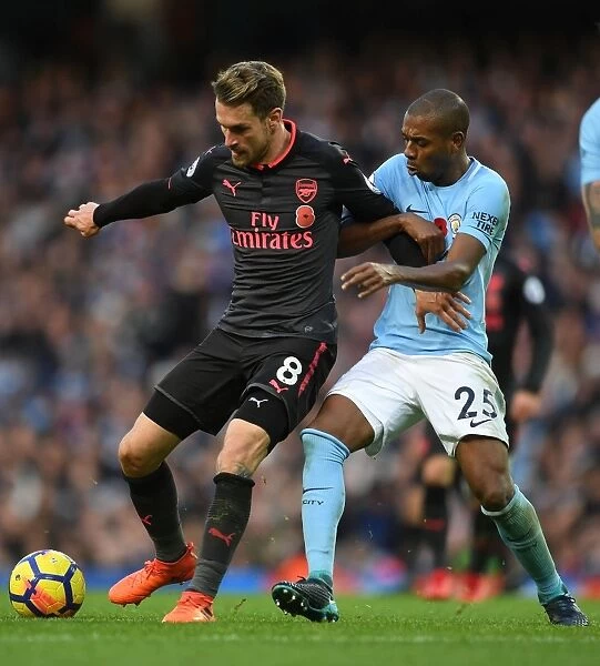 Clash of Midfield Titans: Ramsey vs. Fernandinho, Premier League 2017-18 - Arsenal's Ramsey Takes on Manchester City's Fernandinho