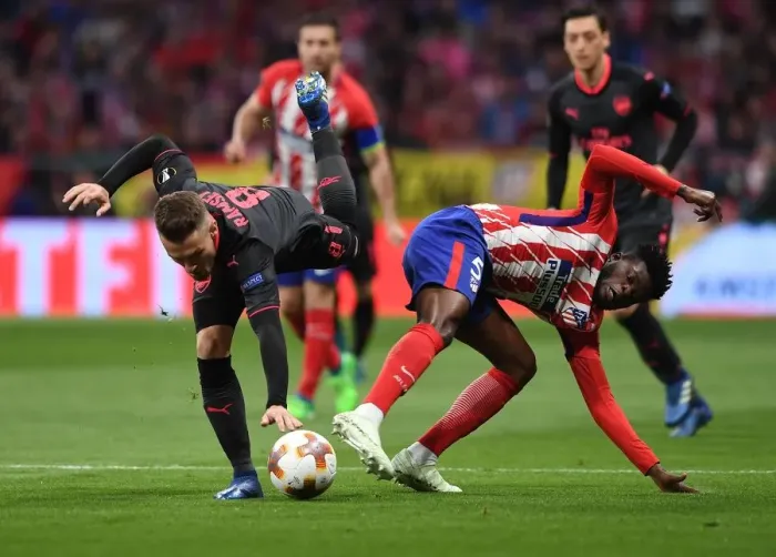 Framed Print : Clash of Midfield Titans: Ramsey vs. Partey - Arsenal vs. Atletico Madrid, UEFA Europa League Semi-Final Framed Print : Clash of Midfield Titans: Ramsey vs. Partey - Arsenal vs. Atletico Madrid, UEFA Europa League Semi-Final