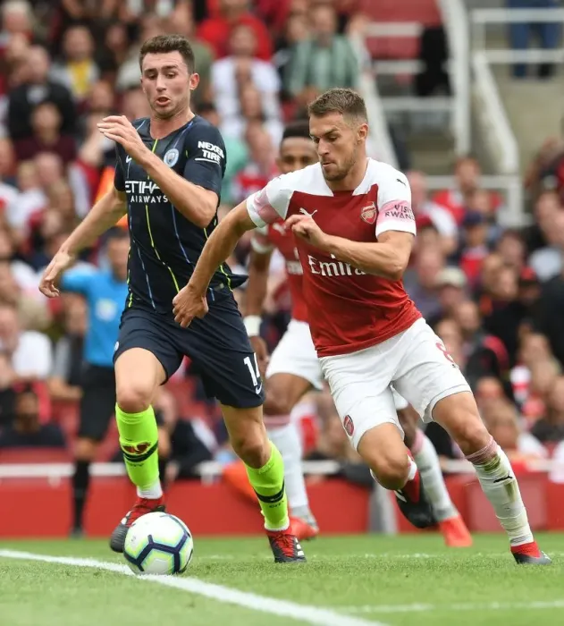 Framed Print : Clash of the Midfield Titans: Ramsey vs. Laporte - Arsenal vs. Manchester City, Premier League 2018-19