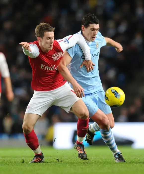 Framed Print : Clash of Midfield Titans: Ramsey vs. Barry - Manchester City vs. Arsenal, Premier League, 2011 Framed Print : Clash of Midfield Titans: Ramsey vs. Barry - Manchester City vs. Arsenal, Premier League, 2011