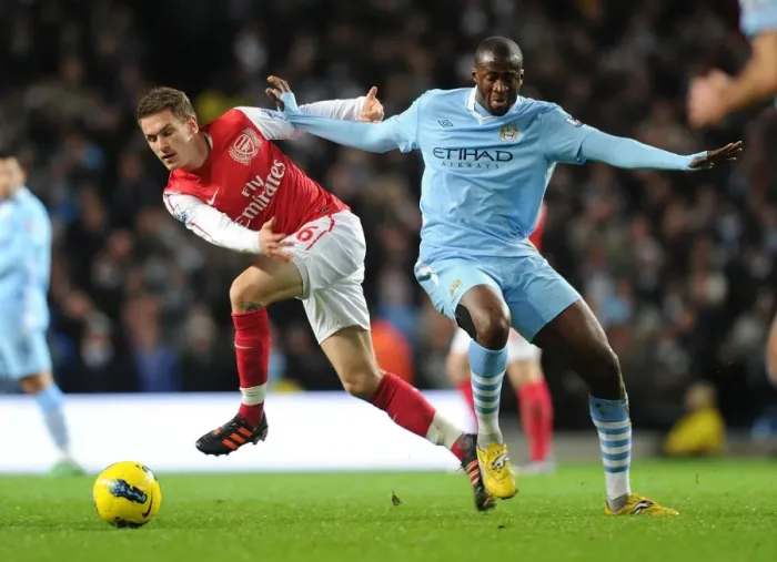 Framed Print : Clash of Midfield Titans: Ramsey vs. Yaya Toure, Manchester City vs. Arsenal, Premier League Showdown (2011-12)