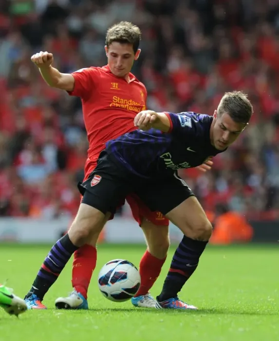Framed Print : Clash of Midfield Titans: Ramsey vs. Allen (Liverpool vs. Arsenal, 2012-13) Framed Print : Clash of Midfield Titans: Ramsey vs. Allen (Liverpool vs. Arsenal, 2012-13)
