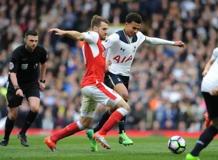 Framed Print : Clash of Midfield Titans: Ramsey vs Alli in the Premier League Battle between Arsenal and Tottenham Framed Print : Clash of Midfield Titans: Ramsey vs Alli in the Premier League Battle between Arsenal and Tottenham