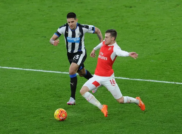Framed Print : Clash of Midfield Titans: Ramsey vs Mitrovic in Arsenal vs Newcastle Showdown Framed Print : Clash of Midfield Titans: Ramsey vs Mitrovic in Arsenal vs Newcastle Showdown