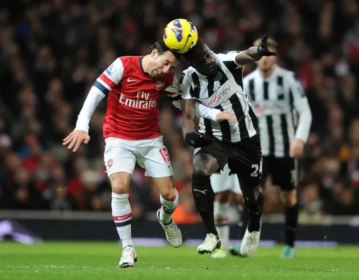 Framed Print : Clash of Midfield Titans: Santi Cazorla vs. Cheick Tiote (Arsenal vs. Newcastle United, 2012-13)