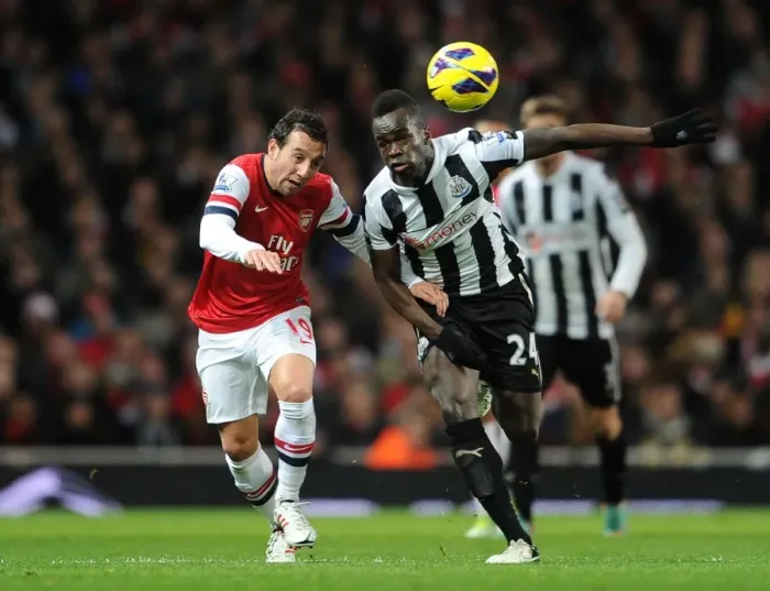 Framed Print : Clash of Midfield Titans: Santi Cazorla vs. Cheick Tiote (Arsenal vs. Newcastle United, 2012-13) Framed Print : Clash of Midfield Titans: Santi Cazorla vs. Cheick Tiote (Arsenal vs. Newcastle United, 2012-13)