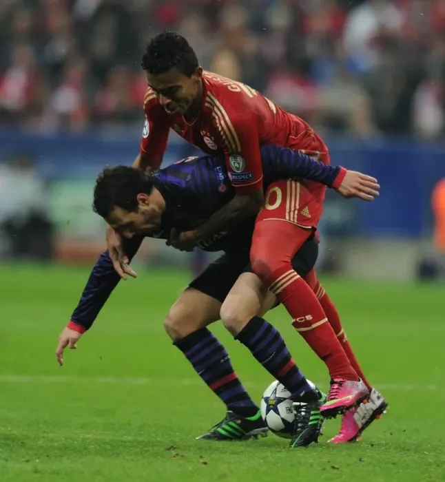 Framed Print : Clash of Midfield Titans: Santi Cazorla vs. Luiz Gustavo - Arsenal vs. Bayern Munich, UEFA Champions League 2013 Framed Print : Clash of Midfield Titans: Santi Cazorla vs. Luiz Gustavo - Arsenal vs. Bayern Munich, UEFA Champions League 2013