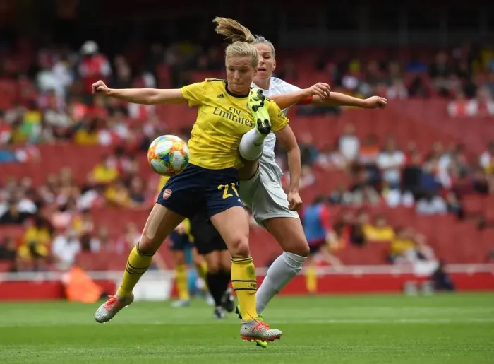 Framed Print : Clash of Midfield Titans: Tabea Kemme vs. Melanie Leupolz at the Emirates Cup