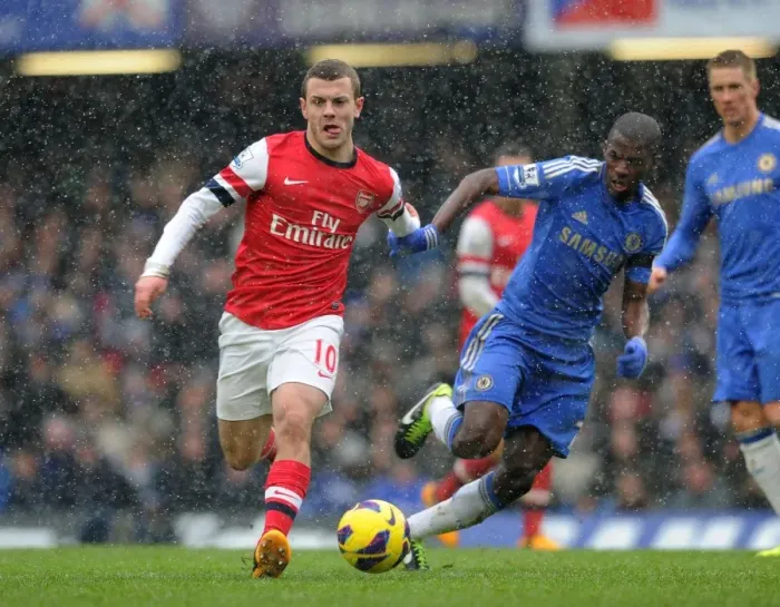 Framed Print : Clash of Midfield Titans: Wilshere vs. Ramires, Premier League 2012-13 Framed Print : Clash of Midfield Titans: Wilshere vs. Ramires, Premier League 2012-13