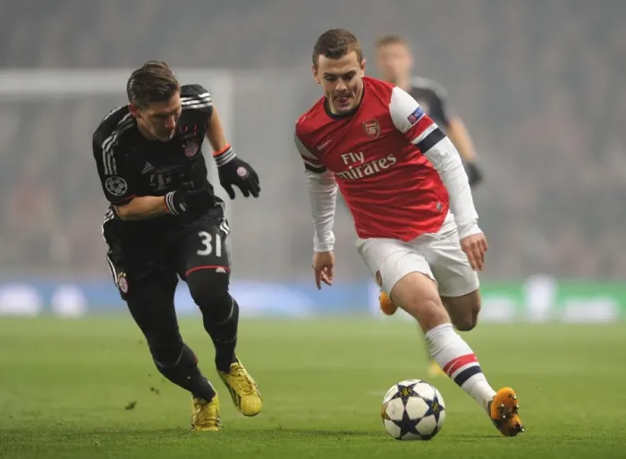 Framed Print : Clash of Midfield Titans: Wilshere vs. Schweinsteiger (Arsenal vs. Bayern Munich, 2013) Framed Print : Clash of Midfield Titans: Wilshere vs. Schweinsteiger (Arsenal vs. Bayern Munich, 2013)