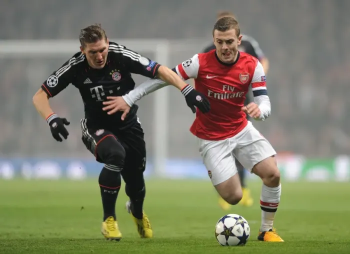 Framed Print : Clash of Midfield Titans: Wilshere vs. Schweinsteiger (Arsenal vs. Bayern Munich, 2013 Champions League)