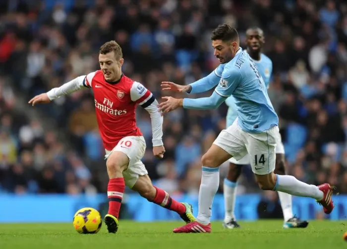 Framed Print : Clash of Midfield Titans: Wilshere vs. Garcia - Manchester City vs. Arsenal, Premier League 2013-14 Framed Print : Clash of Midfield Titans: Wilshere vs. Garcia - Manchester City vs. Arsenal, Premier League 2013-14