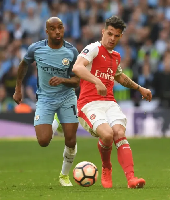 Framed Print : Clash of Midfield Titans: Xhaka vs. Delph - Arsenal vs. Manchester City FA Cup Semi-Final Framed Print : Clash of Midfield Titans: Xhaka vs. Delph - Arsenal vs. Manchester City FA Cup Semi-Final