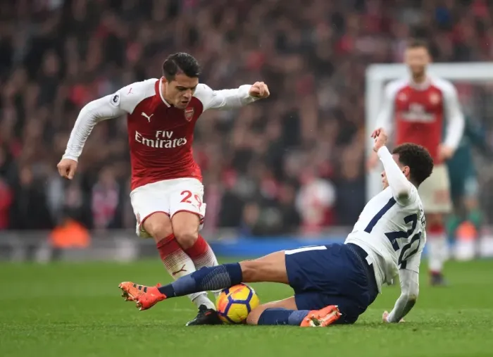 Framed Print : Clash of Midfield Titans: Xhaka vs Alli in Arsenal vs Tottenham Showdown Framed Print : Clash of Midfield Titans: Xhaka vs Alli in Arsenal vs Tottenham Showdown