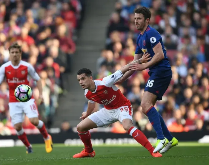Framed Print : Clash of Midfield Titans: Xhaka vs Carrick (Arsenal vs Manchester United, Premier League 2016-17)