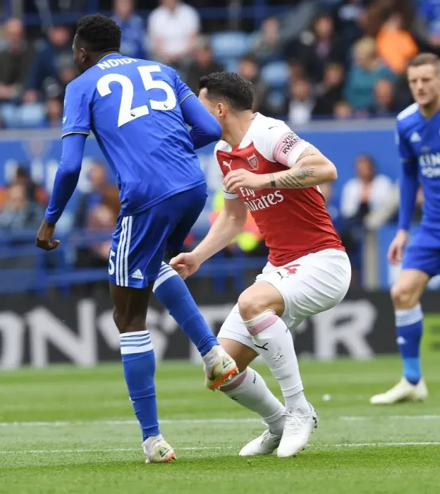 Framed Print : Clash of Midfield Titans: Xhaka vs Ndidi in Leicester City vs Arsenal FC Framed Print : Clash of Midfield Titans: Xhaka vs Ndidi in Leicester City vs Arsenal FC
