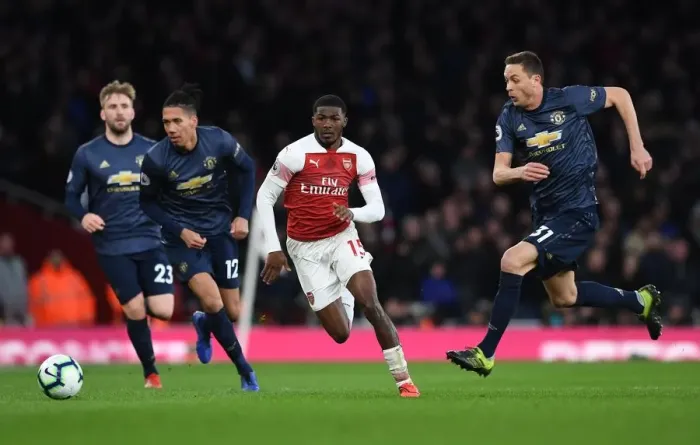 Framed Print : Clash of Midfielders: Ainsley Maitland-Niles vs Nemanja Matic (Arsenal vs Manchester United, 2018-19) Framed Print : Clash of Midfielders: Ainsley Maitland-Niles vs Nemanja Matic (Arsenal vs Manchester United, 2018-19)