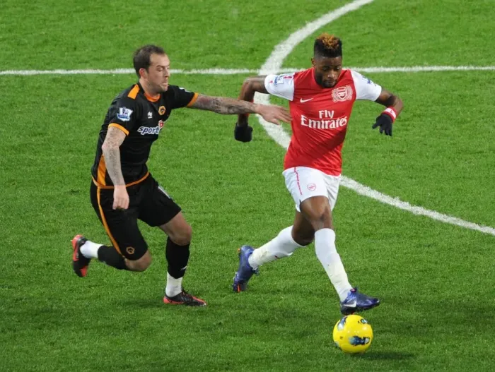 Framed Print : Clash of Midfielders: Alex Song vs. Steven Fletcher - Arsenal vs. Wolverhampton Wanderers, Premier League, 2011