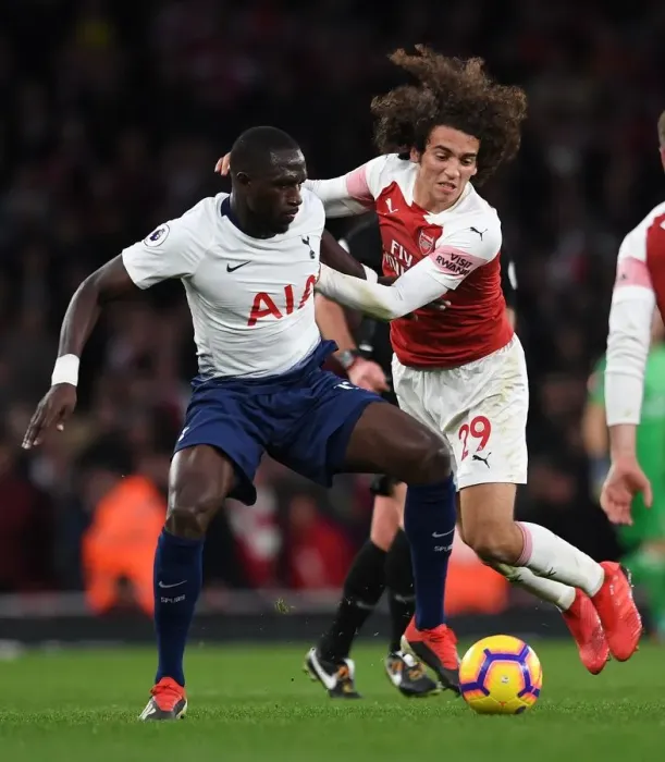 Framed Print : Clash of Midfielders: Guendouzi vs. Sissoko in the Arsenal vs. Tottenham Rivalry