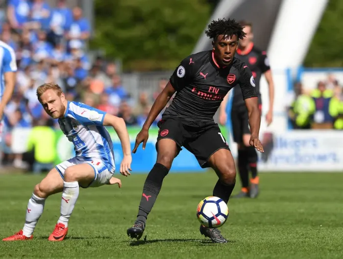 Framed Print : Clash of Midfielders: Iwobi vs. Pritchard - Huddersfield Town vs. Arsenal, Premier League