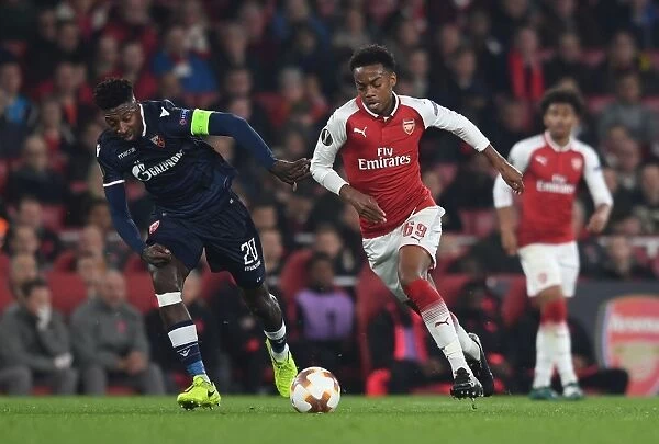 Clash of Midfielders: Joe Willock vs. Mitchell Donald - Arsenal's Europa League Battle