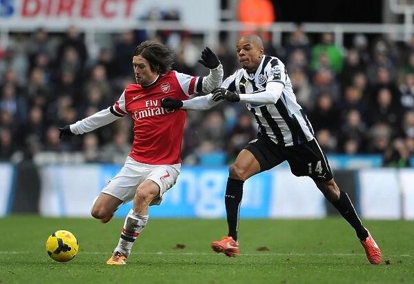 Clash of Midfielders: Rosicky vs. Remy in Newcastle v Arsenal Premier League Showdown
