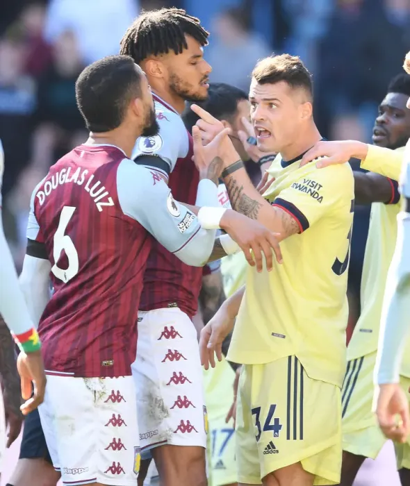 Framed Print : Clash of Midfielders: Xhaka vs. Douglas Luiz in Aston Villa vs. Arsenal Premier League Match Framed Print : Clash of Midfielders: Xhaka vs. Douglas Luiz in Aston Villa vs. Arsenal Premier League Match