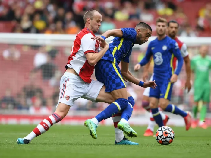 Framed Print : Clash of Minds: Arsenal vs. Chelsea - Rob Holding vs. Hakim Ziyech at the Emirates