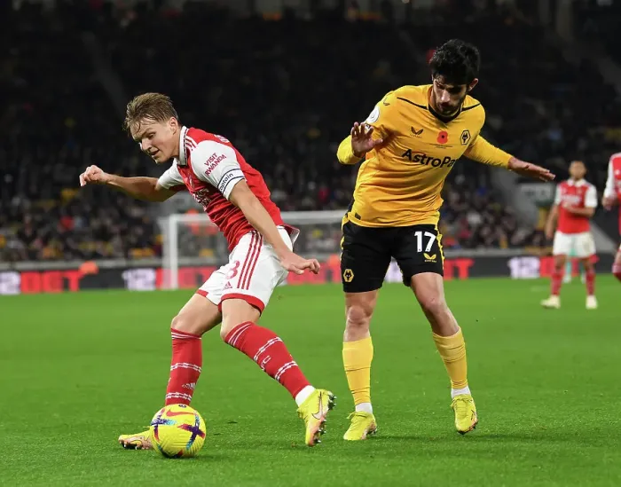 Framed Print : Clash at Molineux: Martin Odegaard vs. Goncalo Guedes - Wolverhampton Wanderers vs. Arsenal FC, Premier League 2022-23 Framed Print : Clash at Molineux: Martin Odegaard vs. Goncalo Guedes - Wolverhampton Wanderers vs. Arsenal FC, Premier League 2022-23