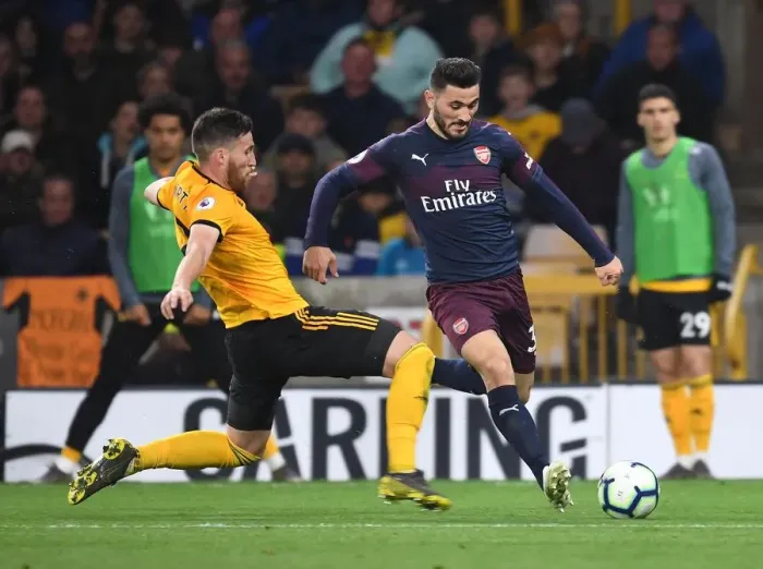 Framed Print : Clash at Molineux: Wolverhampton Wanderers vs. Arsenal FC, Premier League 2018-19 - Sead Kolasinac Faces Off Against Matt Doherty Framed Print : Clash at Molineux: Wolverhampton Wanderers vs. Arsenal FC, Premier League 2018-19 - Sead Kolasinac Faces Off Against Matt Doherty