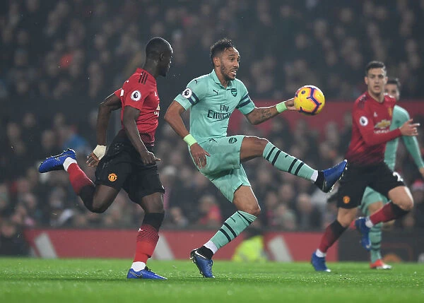 Clash at Old Trafford: Aubameyang vs. Bailly in the Manchester United vs. Arsenal Premier League Showdown