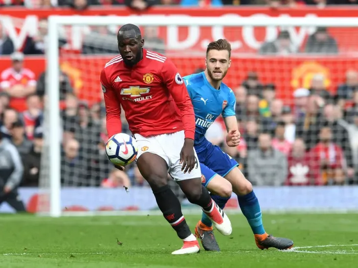 Framed Print : Clash at Old Trafford: Chambers vs Lukaku in Manchester United vs Arsenal Premier League Showdown Framed Print : Clash at Old Trafford: Chambers vs Lukaku in Manchester United vs Arsenal Premier League Showdown