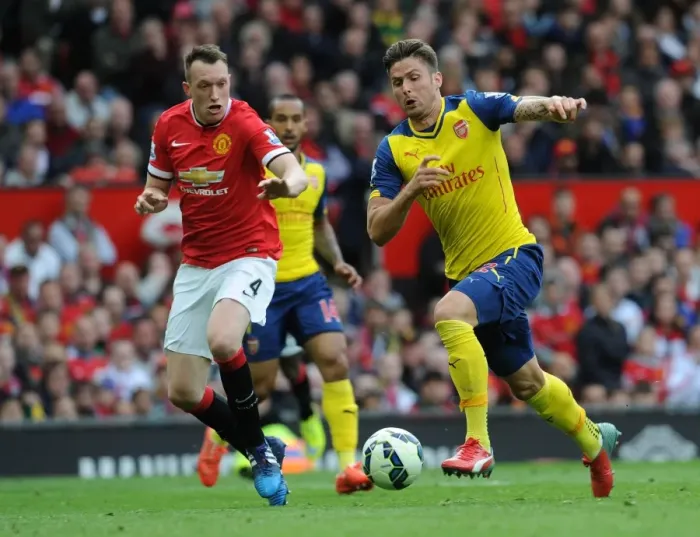 Framed Print : Clash at Old Trafford: Giroud vs Jones - Premier League Showdown, 2014-15 Framed Print : Clash at Old Trafford: Giroud vs Jones - Premier League Showdown, 2014-15