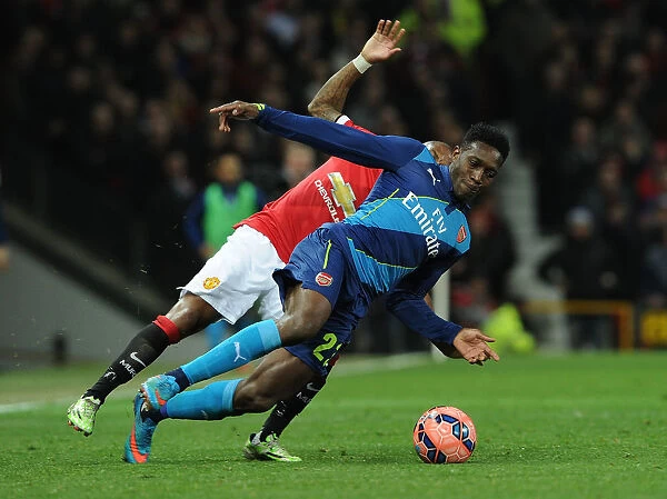 Clash at Old Trafford: Intense Battle Between Welbeck and Young - FA Cup Quarterfinals: Manchester United vs. Arsenal