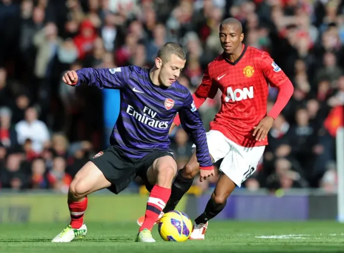 Framed Print : Clash at Old Trafford: Wilshere vs. Young