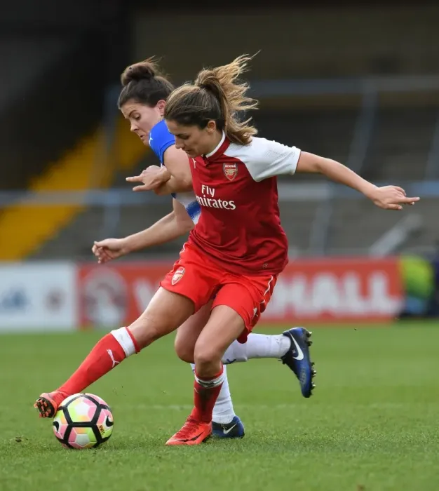 Framed Print : Clash on the Pitch: Danielle van de Donk vs. Brooke Chaplen in Women's Super League Action